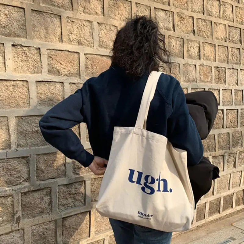 Fashion shoulder bag with ugh lettering